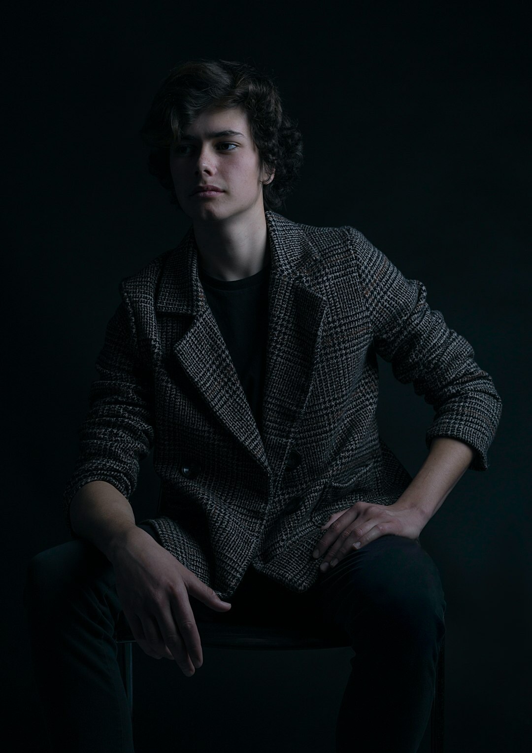 Studio portrait of a young man in a blazer