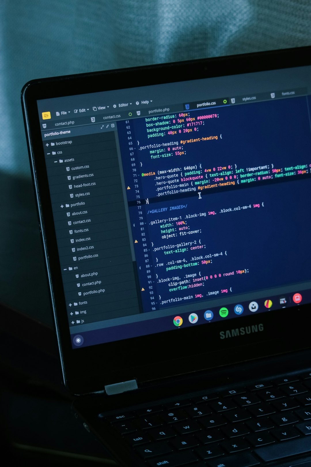 Close-up of a laptop screen displaying lines of code